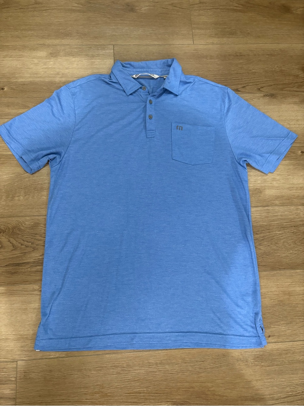 Travis Mathew Light Blue Polo with Chest Pocket